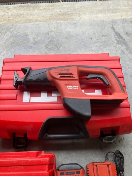 Hilti, saber saw, dyna drill and skill saw, batteries and charger . Carousel 2