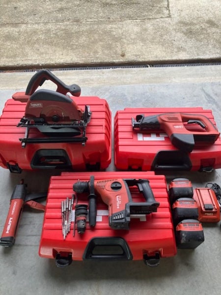Hilti, saber saw, dyna drill and skill saw, batteries and charger . Carousel 1