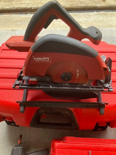 Hilti, saber saw, dyna drill and skill saw, batteries and charger . Carousel 6
