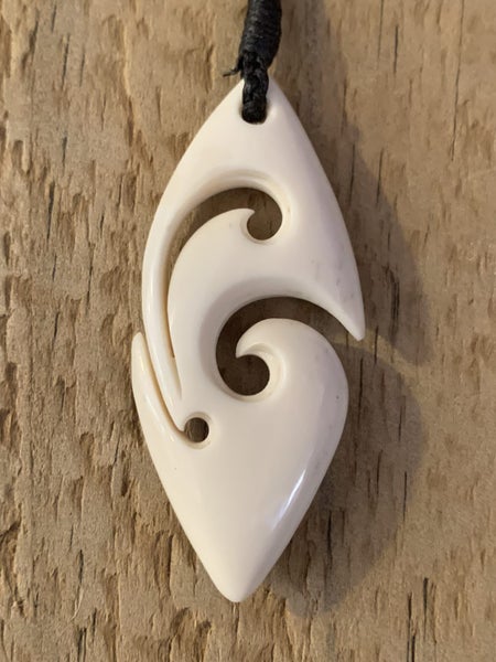 NZ BONE PENDANT DOUBLE KORU Carousel 1