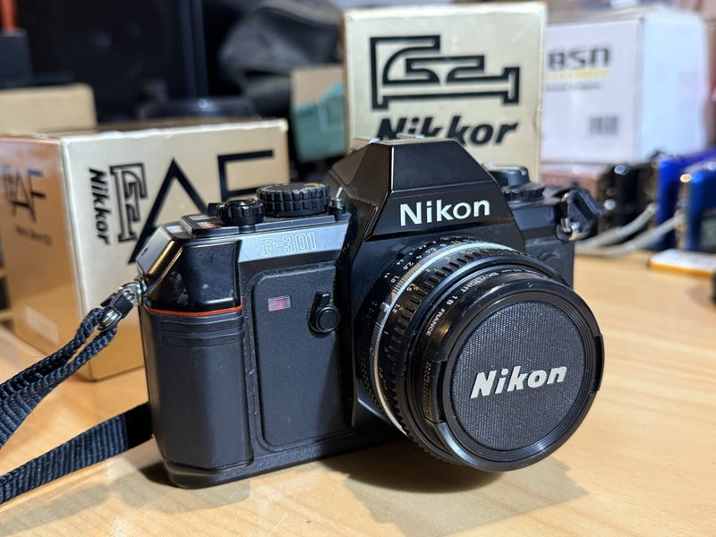 Nikon F-301 35mm Camera and Lenses Carousel 1