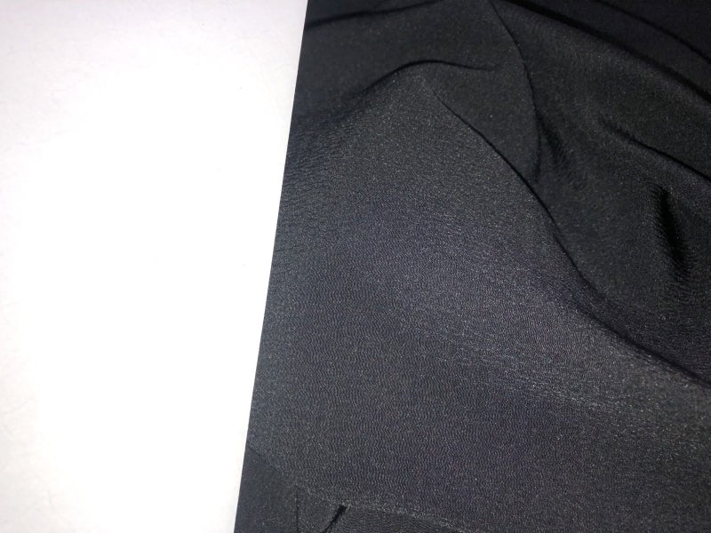 Black non stretchy Paula Ryan fabric 150 x 6.5 metres Carousel 1