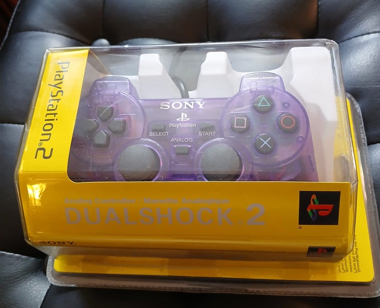 Brand New Sealed PlayStation 2 PS2 Purple Controller Carousel 1