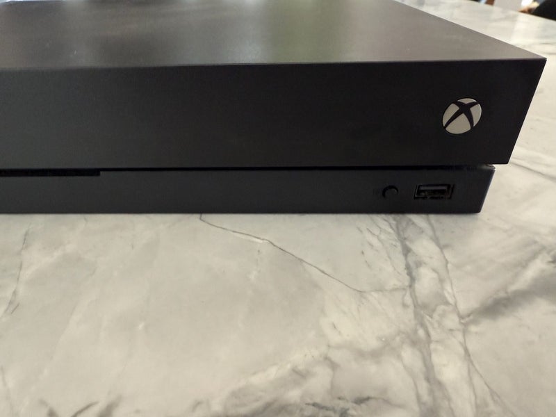 Xbox One X 1TB Console Carousel 1