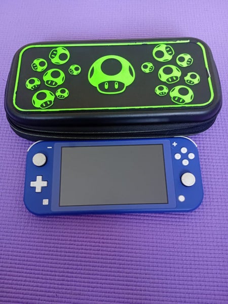 Blue Nintendo switch lite with glow-in-the-dark carry case Carousel 1
