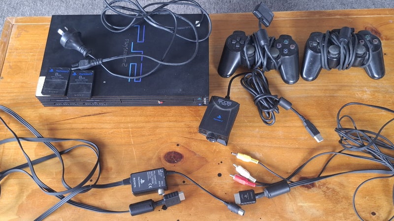 PS2 Console, 13 Games and Accessories Carousel 1