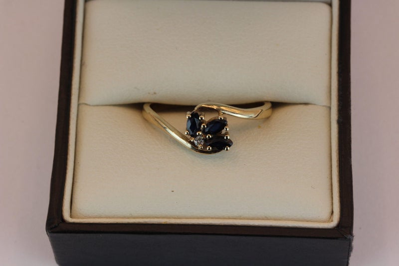 9ct Twisted Sapphire & Diamond ring Carousel 1