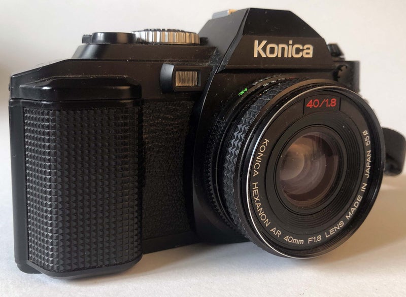 Konica FS-1 with clean 40 mm F 1.8 lens. Carousel 1