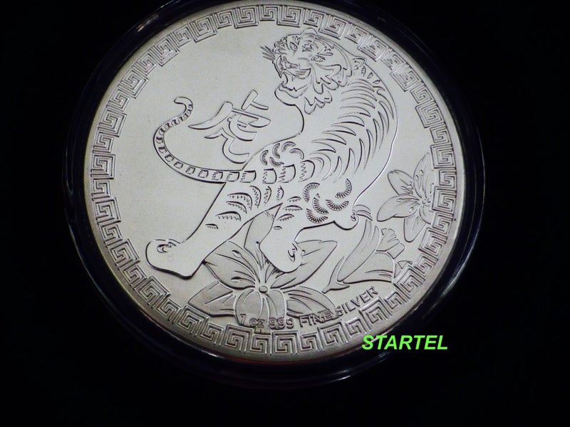 NZ Mint Tiger 1 Oz silver bullion coin in capsule Carousel 1