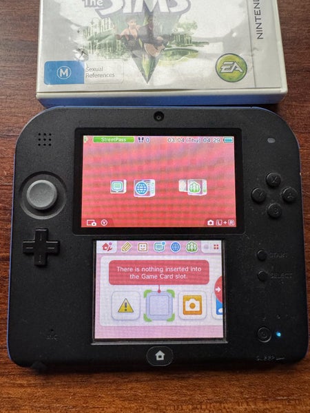 Nintendo 2DS Console + The Sims 3 Game Carousel 4