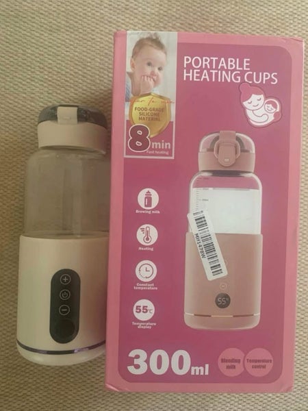 Portable water/milk warmer NEW Carousel 1