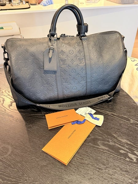 Louis Vuitton Keepall Bandouliere 50 Carousel 1
