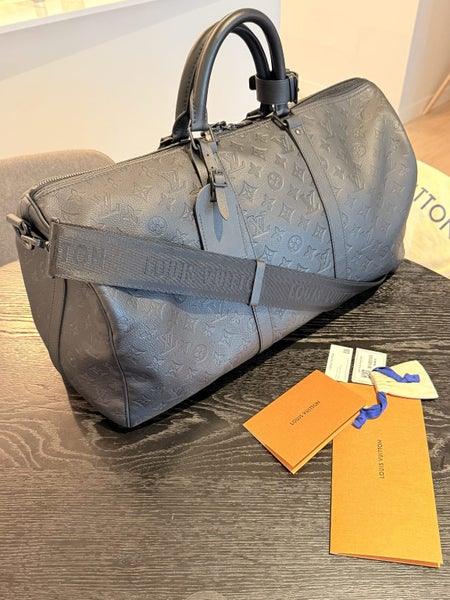 Louis Vuitton Keepall Bandouliere 50 Carousel 2