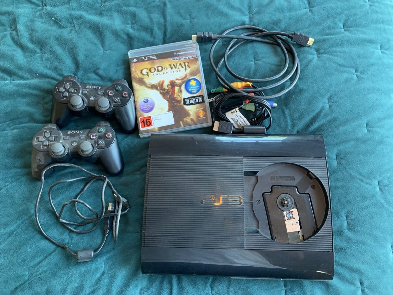 PlayStation 3 game and 2 controllers Carousel 1