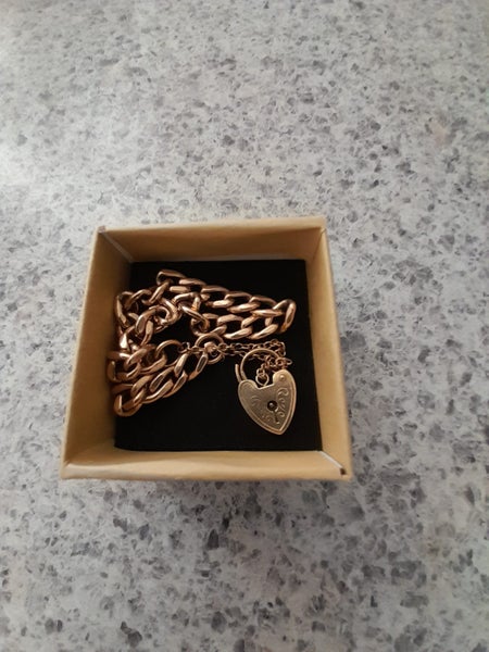 Gold curb link bracelet with detail locket 9 carot 375 Carousel 1