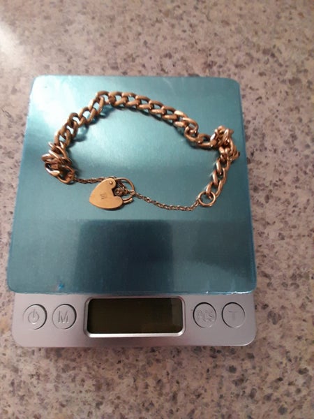 Gold curb link bracelet with detail locket 9 carot 375 Carousel 10