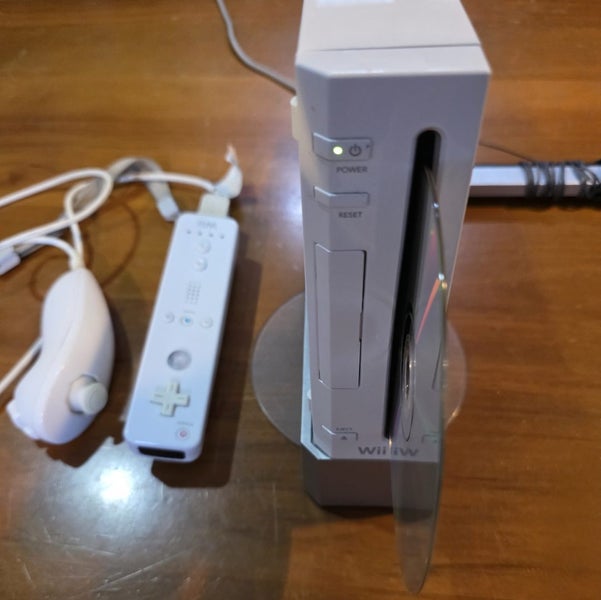 Nintendo Wii Console Package (White, GameCube Ports) + Wii Sports & Wii Play Carousel 2