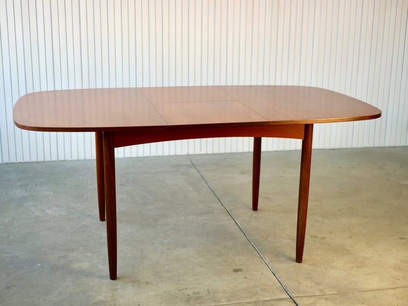 A COMPACT G-PLAN TEAK BUTTERFLY DINING TABLE c1960s Carousel 1