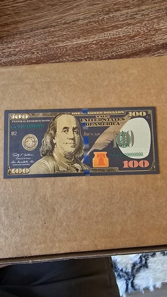 us $100 note in black and gold *imitation* Carousel 1