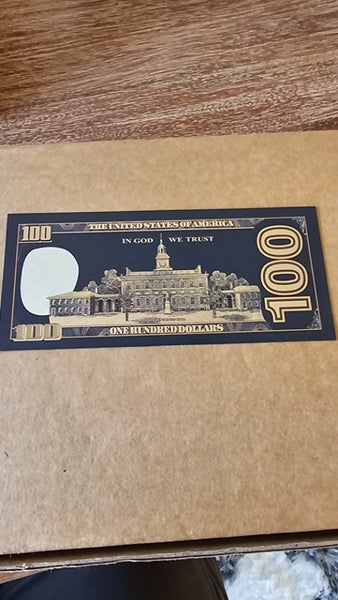 us $100 note in black and gold *imitation* Carousel 2