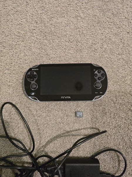 Sony PS Vita LED PCH-1002 + 4GB Vita Card + Charger Carousel 1