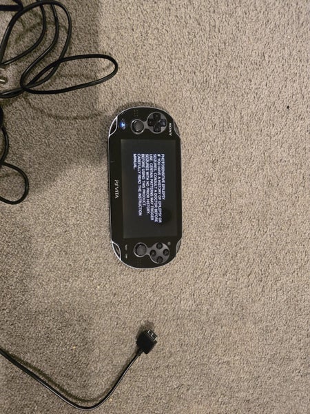 Sony PS Vita LED PCH-1002 + 4GB Vita Card + Charger Carousel 10