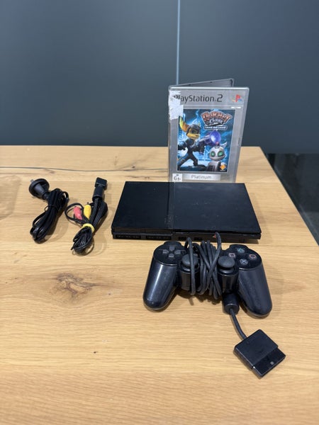 PS2 Slim Complete + Ratchet and Clank: Locked and Loaded Carousel 1