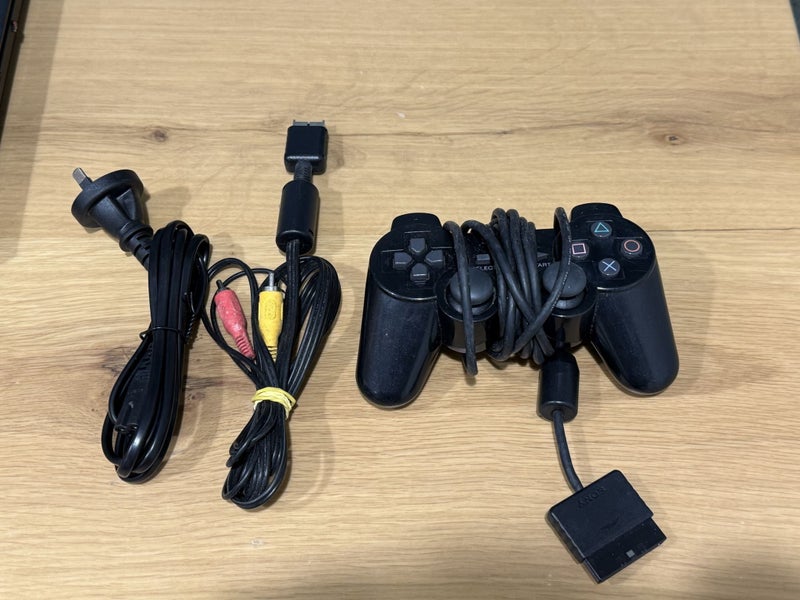 PS2 Slim Complete + Ratchet and Clank: Locked and Loaded Carousel 2