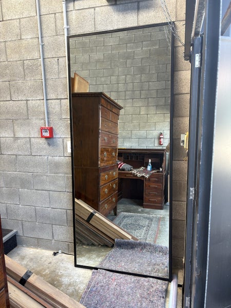 Huge leaner mirror Carousel 1