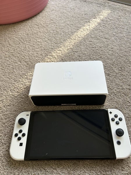 Nintendo Switch OLED (white) Nearly new! Carousel 1