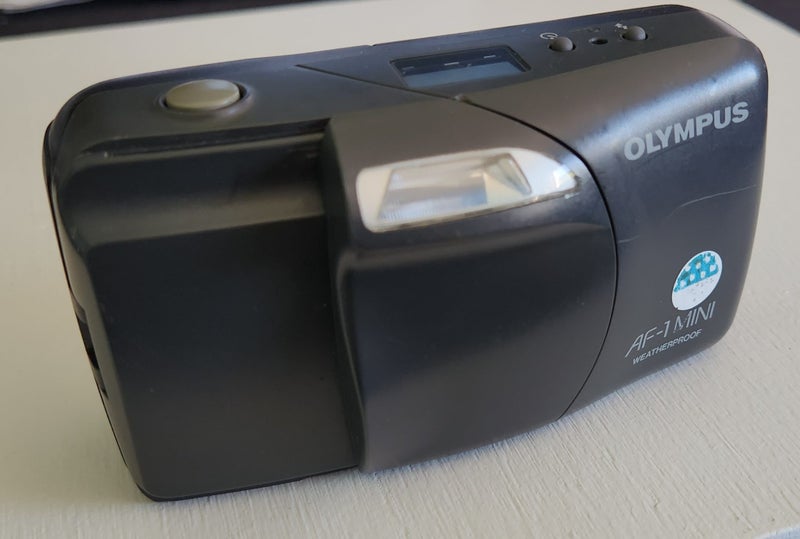 Olympus AF-1 Mini 35mm film camera in box with Manual Carousel 2