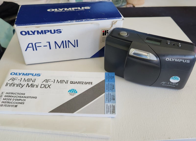 Olympus AF-1 Mini 35mm film camera in box with Manual Carousel 1