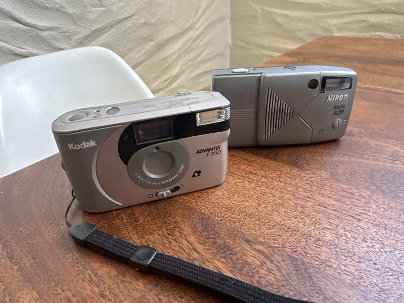 2x APS film cameras Carousel 1