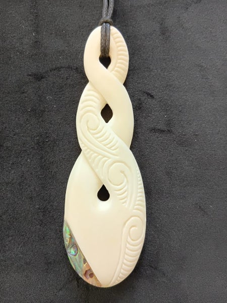 Medium Bone Carving Twist Pendant in Giftbox Carousel 1