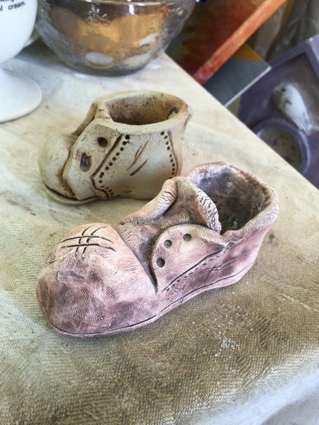 2 POTTERY SHOES READ Carousel 1