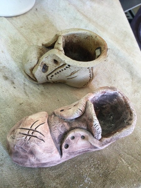 2 POTTERY SHOES READ Carousel 2