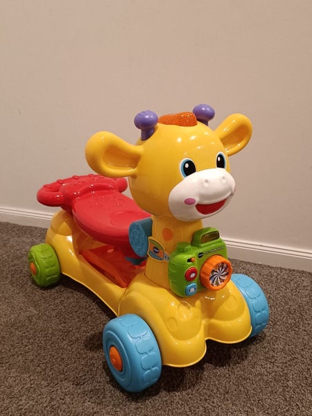 Vtech 4-in-1 giraffe scooter/ ride on Carousel 1