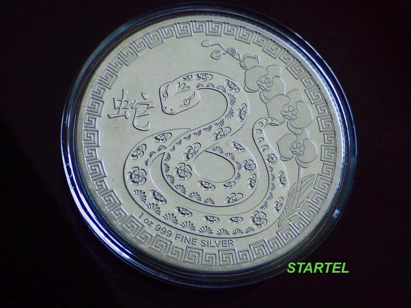 Lunar Snake 1 Oz silver bullion coin in capsules NZ Mint Carousel 1