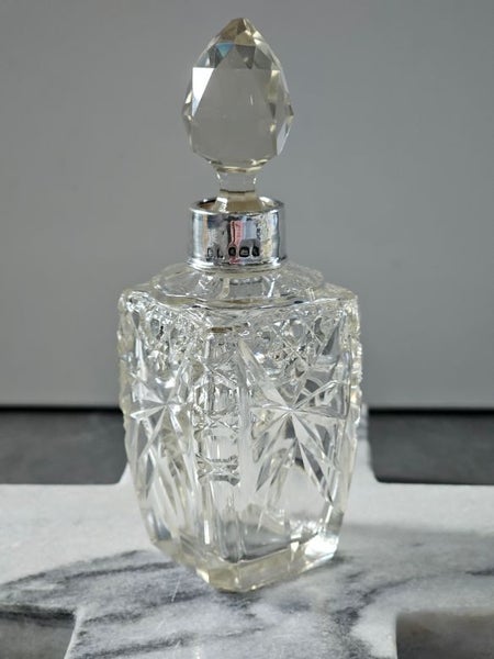 Antique/vintage crystal perfume bottle with stopper and hallmarked silver cuff. Carousel 2