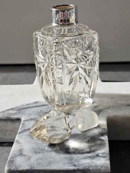 Antique/vintage crystal perfume bottle with stopper and hallmarked silver cuff. Carousel 7