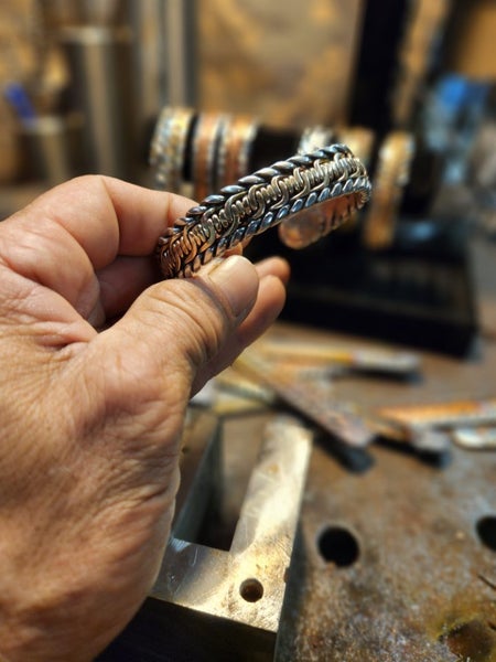 Handmade bracelet. Silicone bronze inside a stainless steel frame Carousel 4