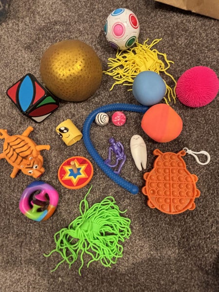 Fidget toys bulk listing ! Mochis popits puzzle ball squishy toys and more! Carousel 9