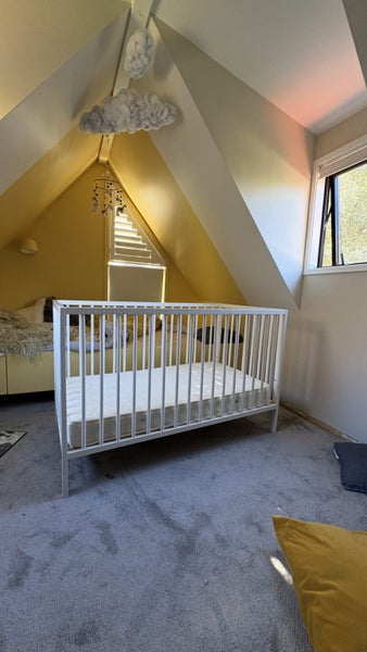 White cot and mattress Carousel 1