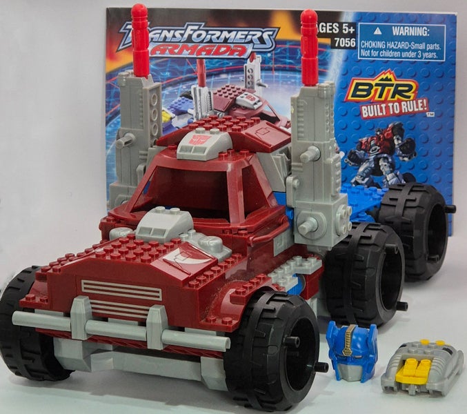 [7056]: Transformers - Optimus Prime with Sparkplug Mini-Con - 2003 Carousel 1