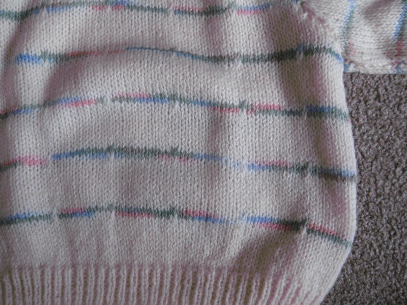 Pretty hand knitted jersey62863242737409111