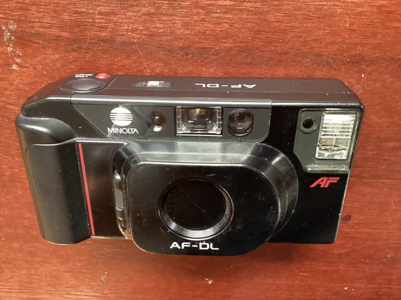 Minolta AF- DL film camera. Carousel 1