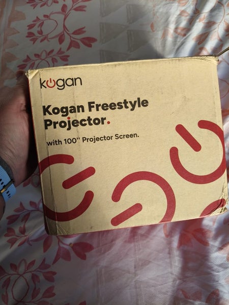 Kogan Freestyle Wi-Fi Projector with 100'' Projector Screen Carousel 1