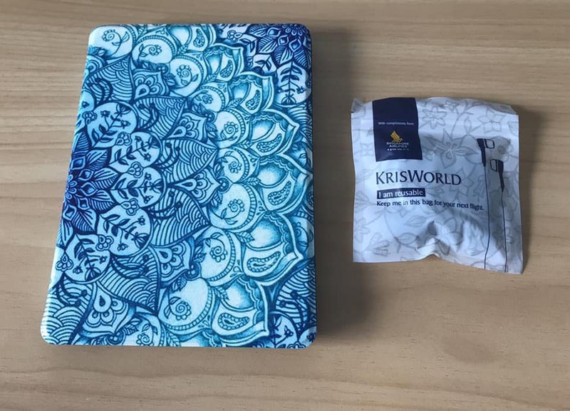Kindle case + FREE Singapore Airline earbuds / in-ear headphones Carousel 1