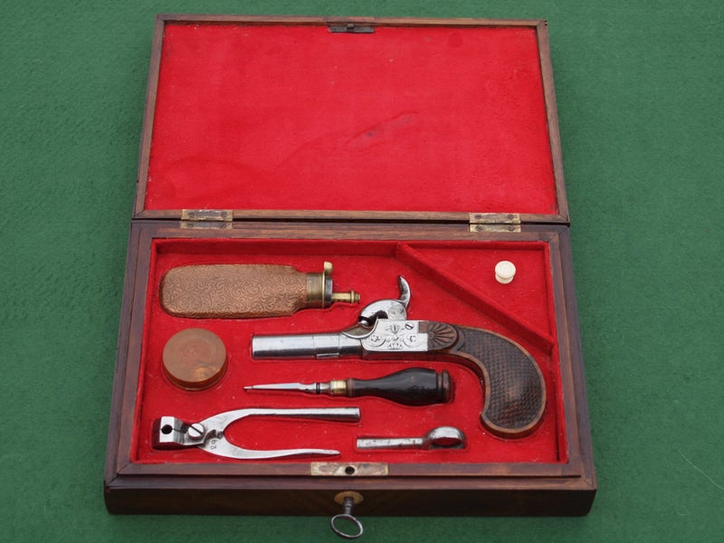 CASED POCKET PISTOL & ACCESSORIES Carousel 1