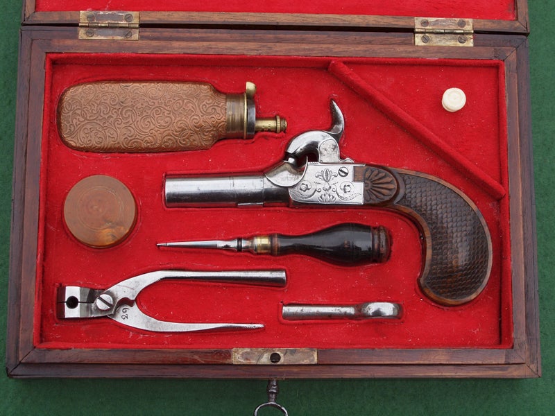 CASED POCKET PISTOL & ACCESSORIES Carousel 2